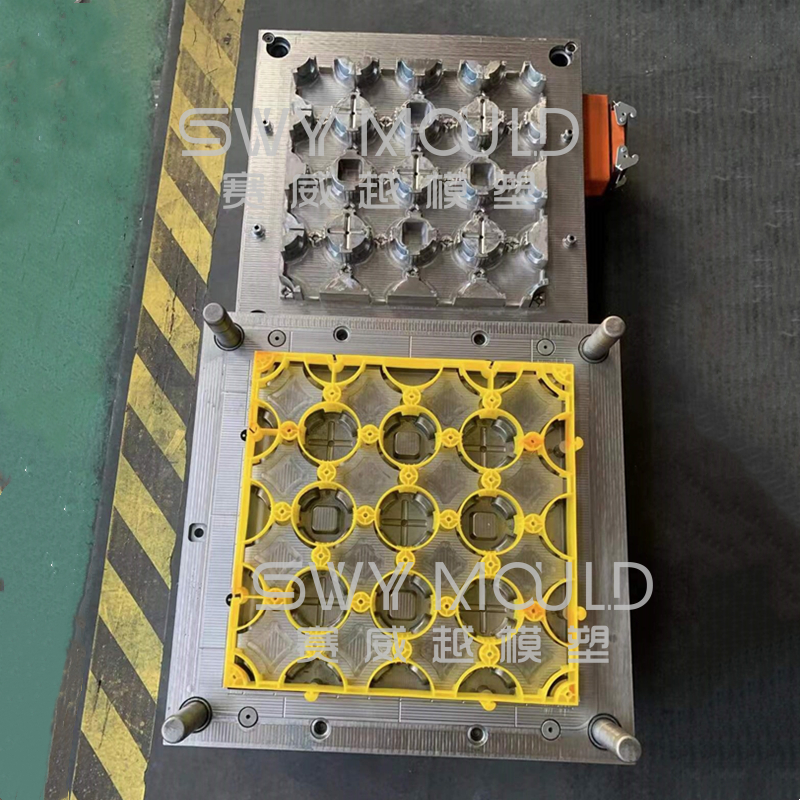What are the safety considerations that need to be addressed when working with plastic kid sand container injection molds?